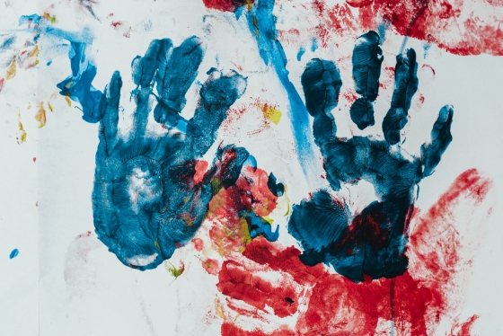 Hand prints in several colours of paint
