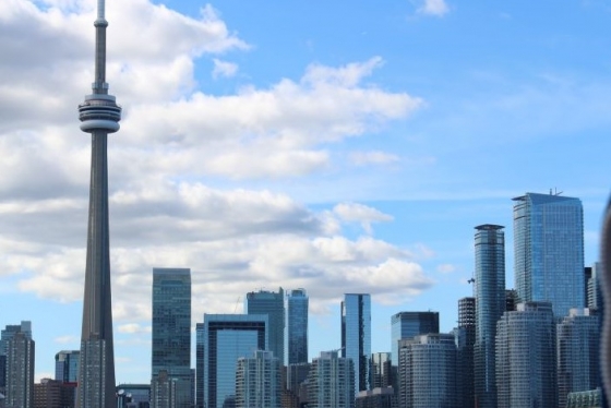 View of Toronto skyline with CN Tower surrounded by skyscrapers