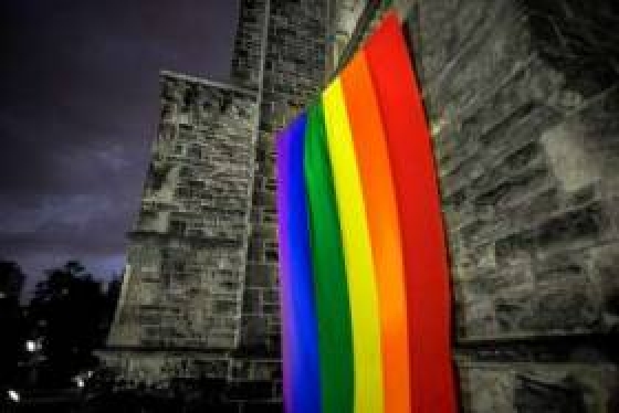 Pride Flag hanging outside u of t building