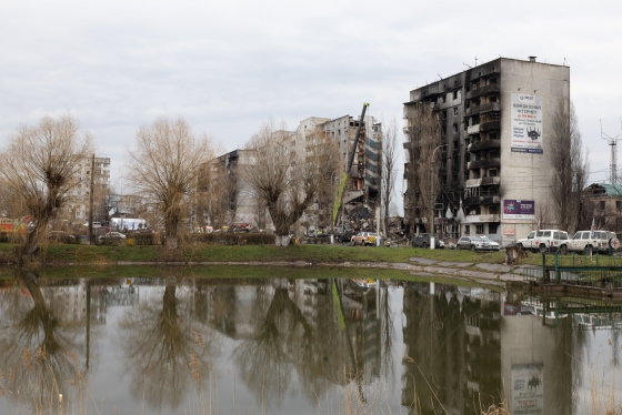 High rise apartment buildings damaged by fire in war.