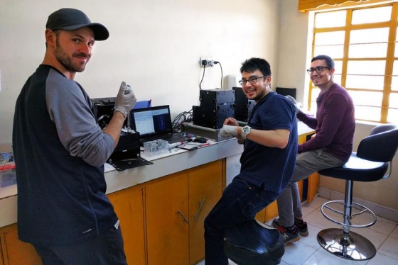 (From left) Christian Fobel, Alphonsus Ng and Julian Lamanna run blood tests on their portable lab-on-a-chip instruments