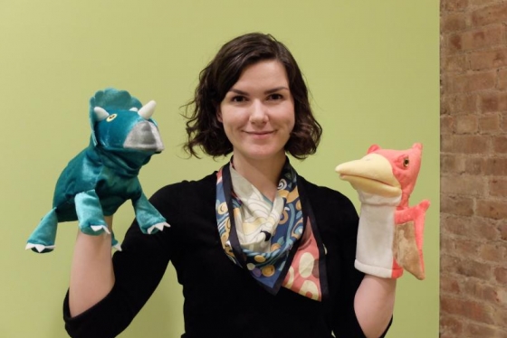 Linguist Ailís Cournane, who specialized in children's language acquisition, holds props from the Child Language Lab that she leads at New York University (photo by Sheng-Fu Wang) 