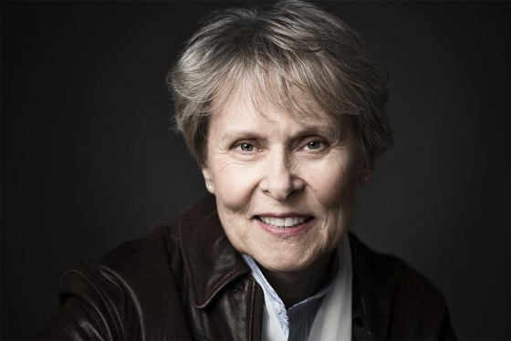 A dramatic photo of Roberta Bondar in front of a dark background.