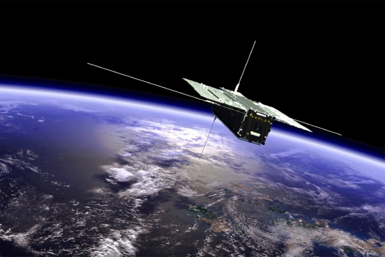 A box-shaped satellite with solar panels spread out like wings floats high above the Earth. A logo on its side says Kepler.