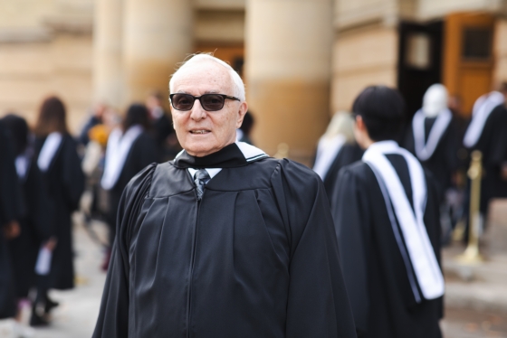 Jacques Leduc standing outside Convocation Hall