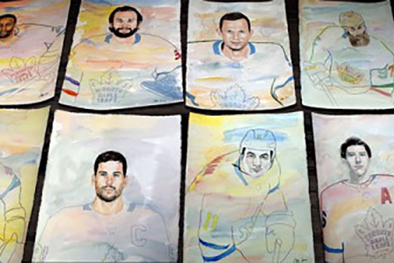 A dozen watercolour portraits of hockey players, laid out on a table. Each has a photorealistic face and a stylized body.