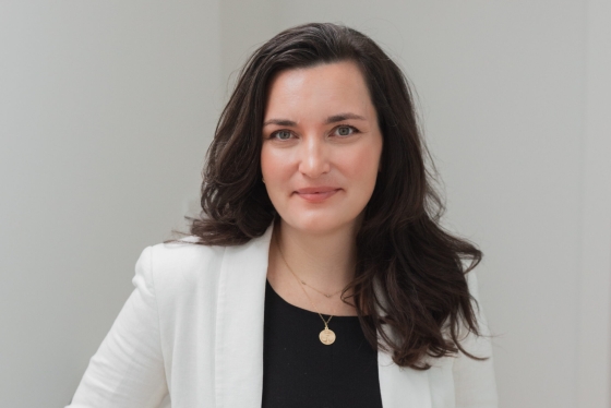 Portrait of Tieghan wearing a white blazer and black shirt