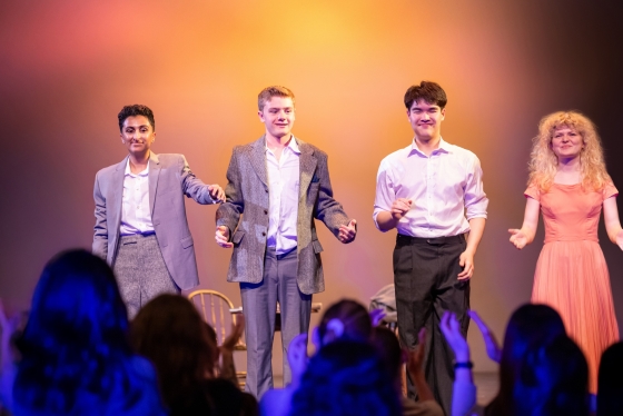 Four students prepare to take a bow on stage at Hart House Theatre drama festival