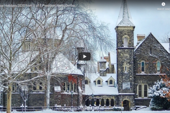 Snow lies on roofs and tree branches outside Croft Chapter House in this still from the holiday video.