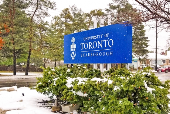 Freshly fallen snow lies around the University of Toronto Scarborough sign.
