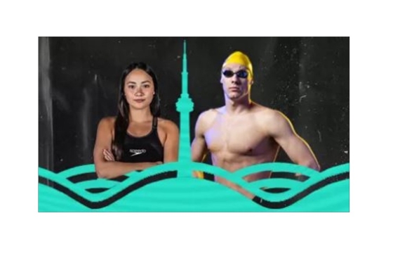 Two swimmers standing together. 