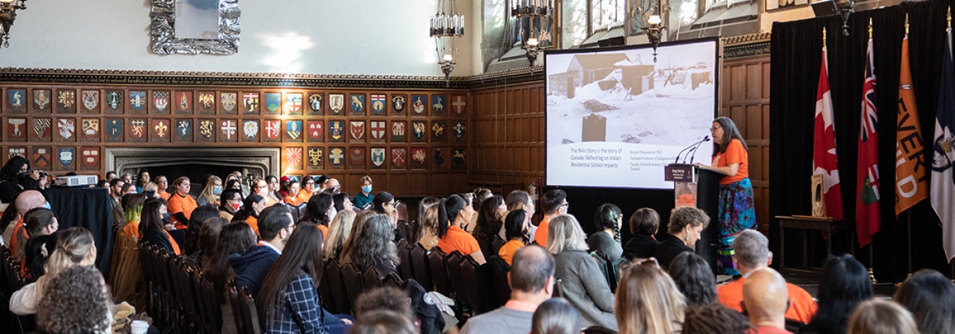 Brenda Wastasecoot speaking to a packed house in Hart House Great Hall.