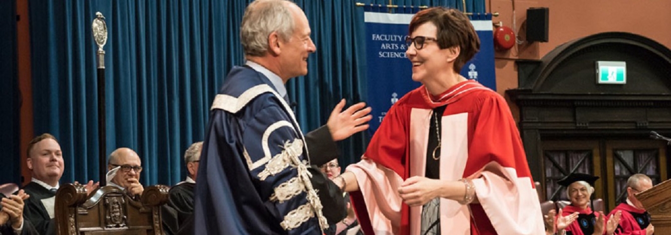 Cindy Blackstock speaks with U of T President Meric Gertler as she receives a Doctor of Laws, honoris causa, from U of T on Monday (photo by Lisa Sakulensky)