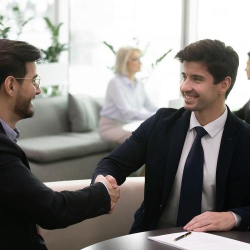 A recruiter hires a young alum