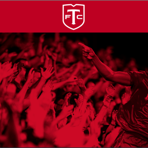Red-tone image of TFC player pointing at the crowd.