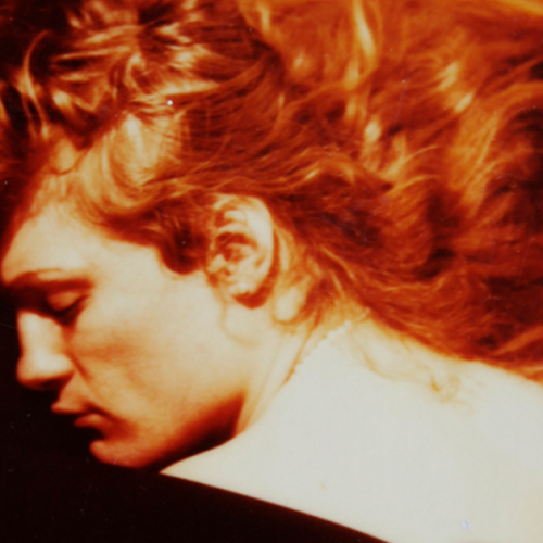 Lorenza Bottner painting of a woman with long, red hair.