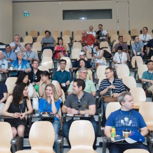 Alumni sitting together in lecture