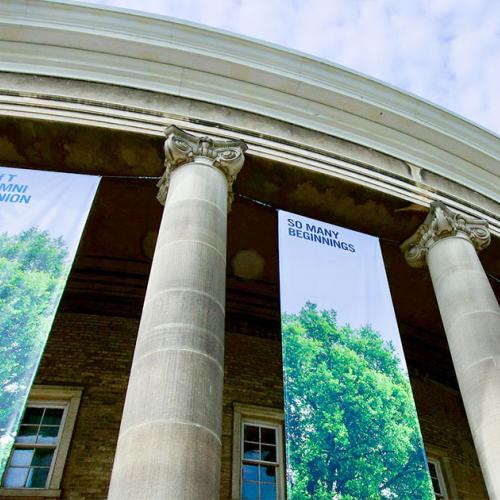 Image of Con Hall with Alumni Reunion banners.