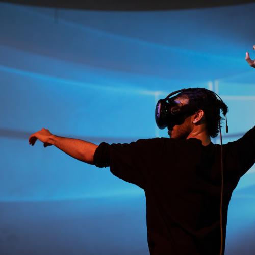 Photo of a man in a VR headset