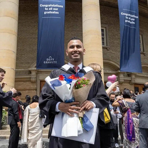 Javiet in front of Convocation Hall