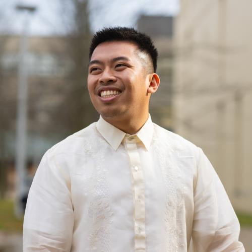 Close-up of Alfonso Ralph Mendoza Manalo smiling outside.