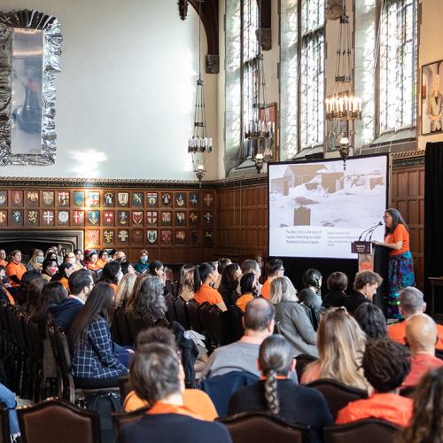 Brenda Wastasecoot speaking to a packed house in Hart House Great Hall.