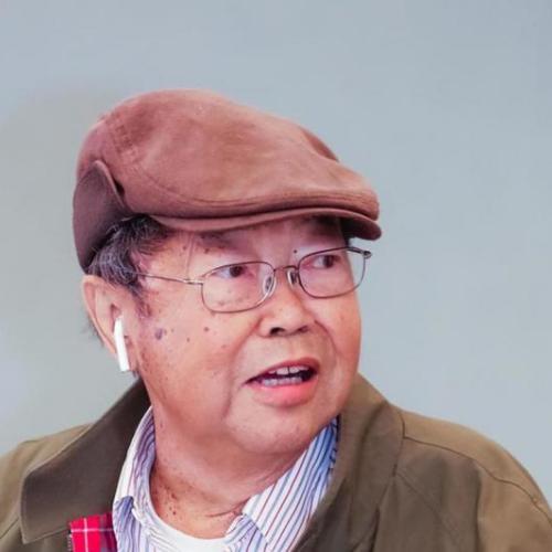 Choong Chin Liew, known as C.C., looks startled as he looks to his left.