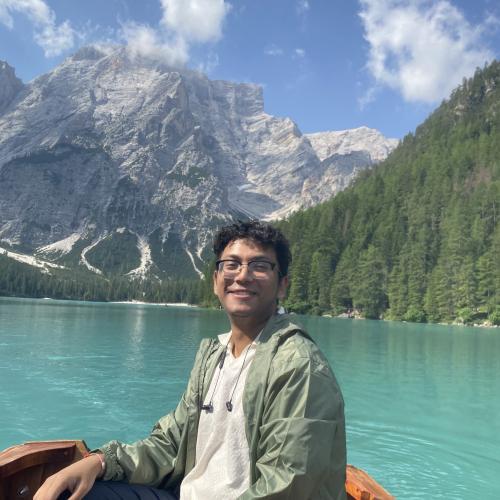 Abidur Rahman in a boat on a lake