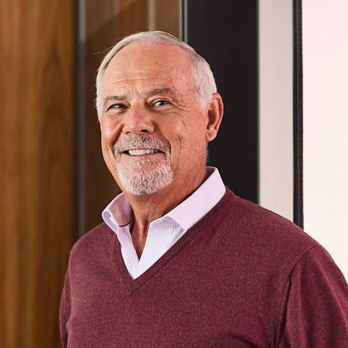 Portrait image of John Cassaday smiling.