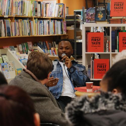 Michael speaking at a book event