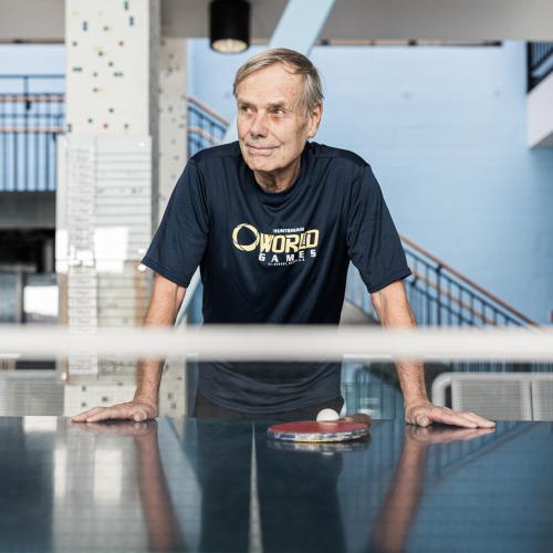 Gordon Cressy standing at a table tennis table
