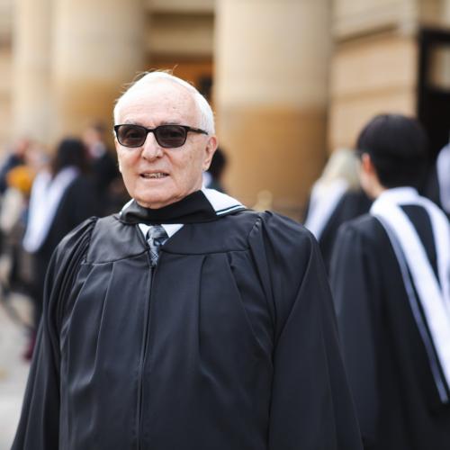 Jacques Leduc standing outside Convocation Hall