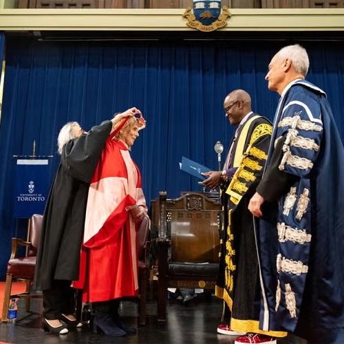 Jane Corkin on stage at a convocation ceremony