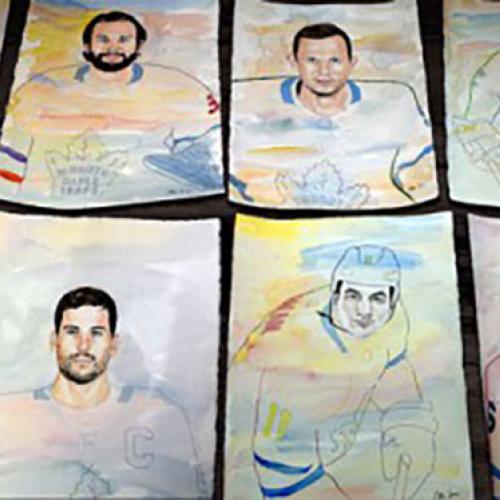 A dozen watercolour portraits of hockey players, laid out on a table. Each has a photorealistic face and a stylized body.