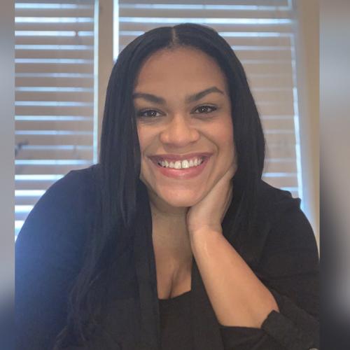 Portrait of Krysta Cooke smiling.