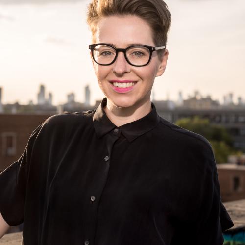 An image of Martine August outdoors smiling.