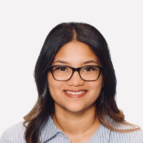 Portrait of Nadine Narain smiling.