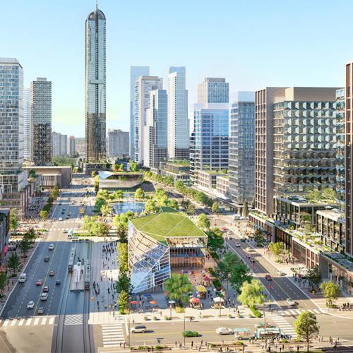 An architectural rendering shows green-roofed glass buildings and a pond between busy roads and skyscrapers.