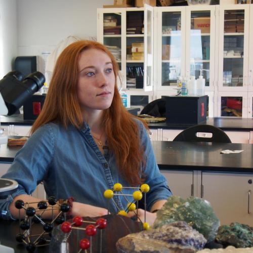 Charlotte Wargniez sitting in a science lab