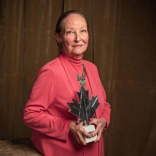 Rosalie Abella holding an award