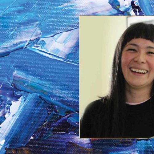 Portrait photo of Thea Lim smiling.