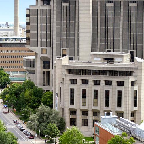 The Claude T. Bissell building sits in front of Robarts Library on leafy St. George Street.
