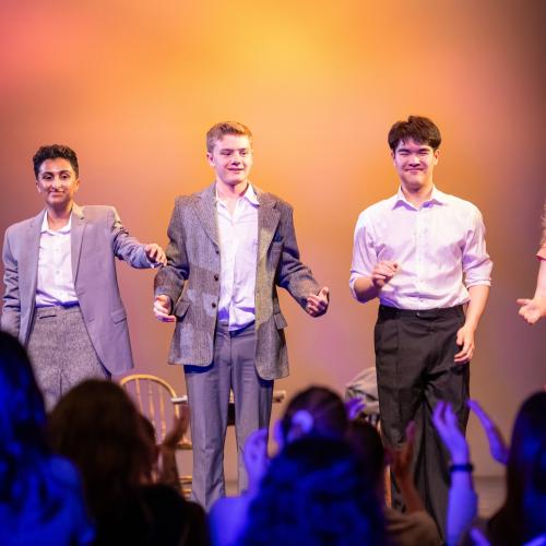 Four students prepare to take a bow on stage at Hart House Theatre drama festival