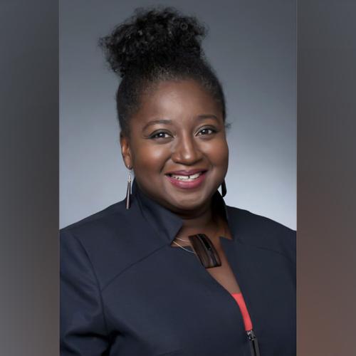 Portrait of Notisha Massaquoi smiling.