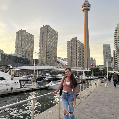 Sera standing with the CN Tower in the background