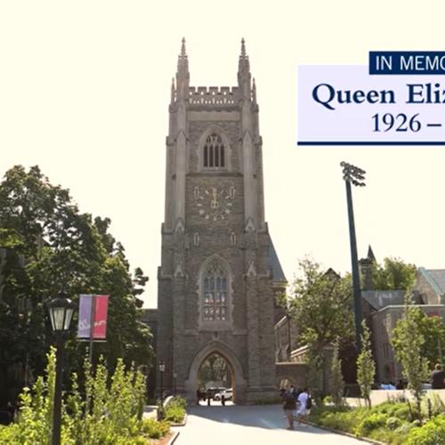 The Soldiers' Tower in sunlight, with text superimposed that says: In memoriam, Queen Elizabeth II.