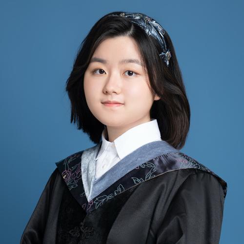 A formal portrait of Vivian Xie in her graduation robes.