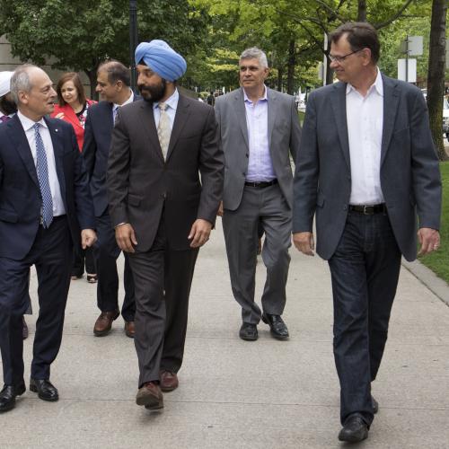 U of T President Meric Gertler, Navdeep Bains, the federal minister of innovation with roundtable group