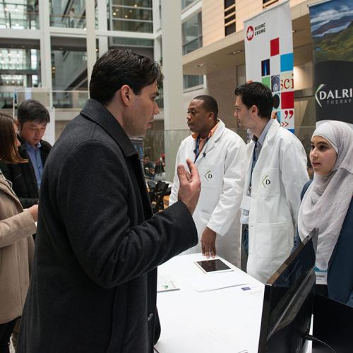 Representatives from Dalriada Therapeutics, a startup launched at the University of Toronto Mississauga, talk to visitors during U of T's Startup Showcase at MaRS on March 1 (photo by Laura Pedersen) 