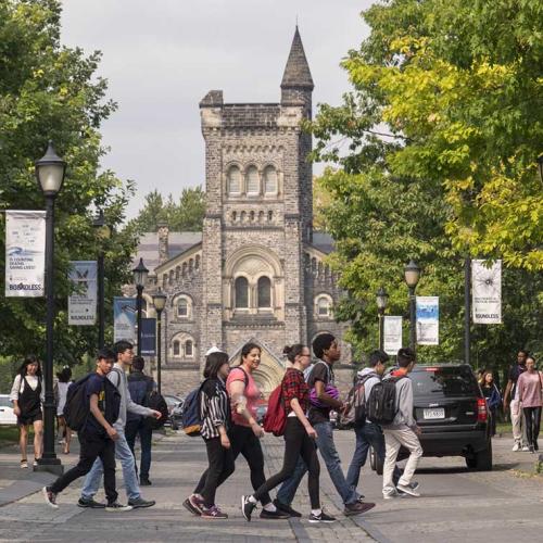 Students cross the road at the University of Toronto. Photo by Geoffrey Vendeville.